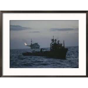  A Trawler Passes Near an Oil Rig in the North Sea Framed 