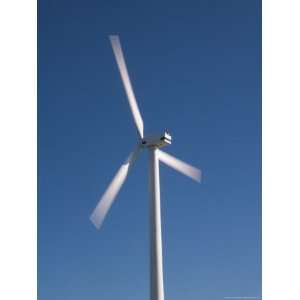  A Turbine Spins in the Wind Generating Electricity Premium 