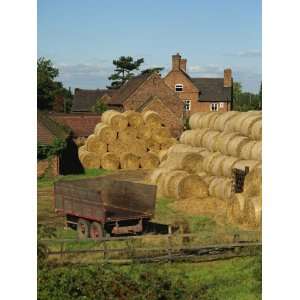 of Straw Bales and a Trailer Near Kingsbury, Warwickshire, England, UK 