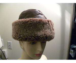 Seifter Associates brown sheepskin and leather hat. Great cold weather 