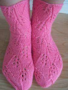 Hand knitted lace pattern socks, bright pink  