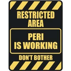   RESTRICTED AREA PERI IS WORKING  PARKING SIGN