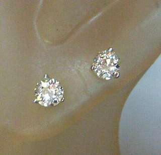 stunning diamond stud earrings feature two old european cut diamonds 