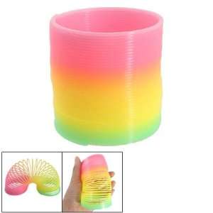   Child Fluorescent Rainbow Color Plastic Slinky Spring: Toys & Games