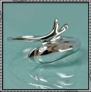   02CT DOLPHIN design real round Diamond ring available in White Gold