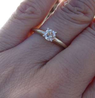 Diamond solitaire engagement ring. Diamond is 4.5mm weighs .37ct 