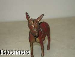 ANTIQUE RED RIDING DONKEY MULE WITH SADDLE CAST IRON COIN STILL BANK 
