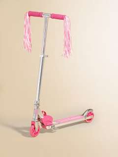 Streamers fly while she rides this pretty in pink scooter.