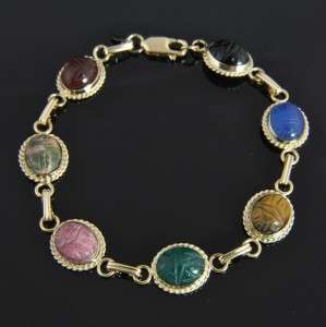   multi gemstone scarab bracelet by Carla set in solid 14k yellow gold