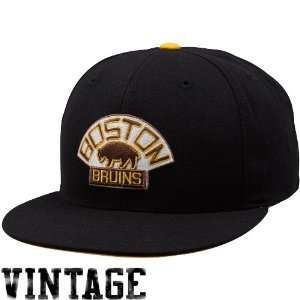  Hats  Mitchell & Ness Boston Bruins Black Vintage Logo Fitted Hat 